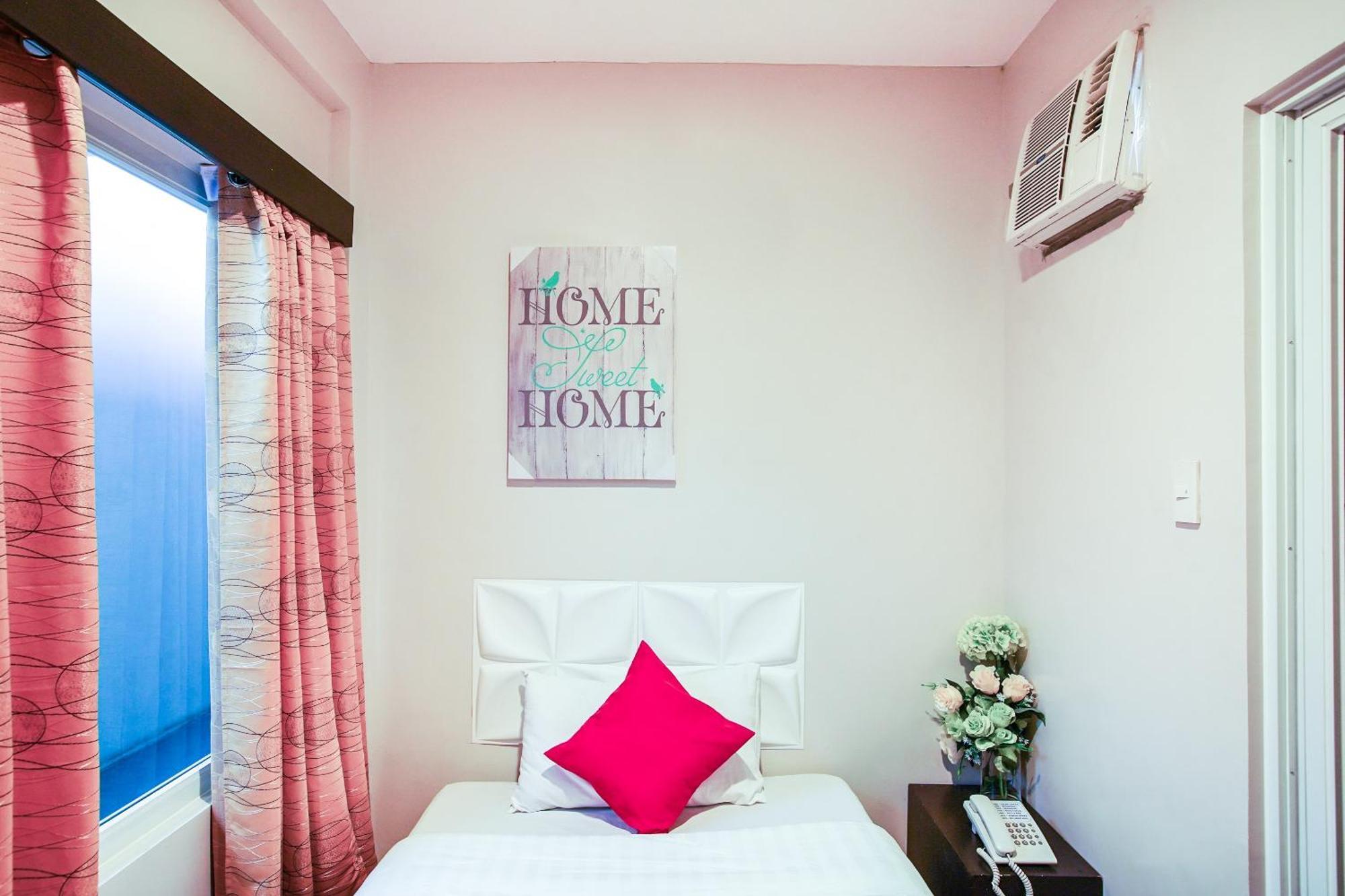 Oyo 489 Casa Mia Hotel Suites General Santos City Buitenkant foto
